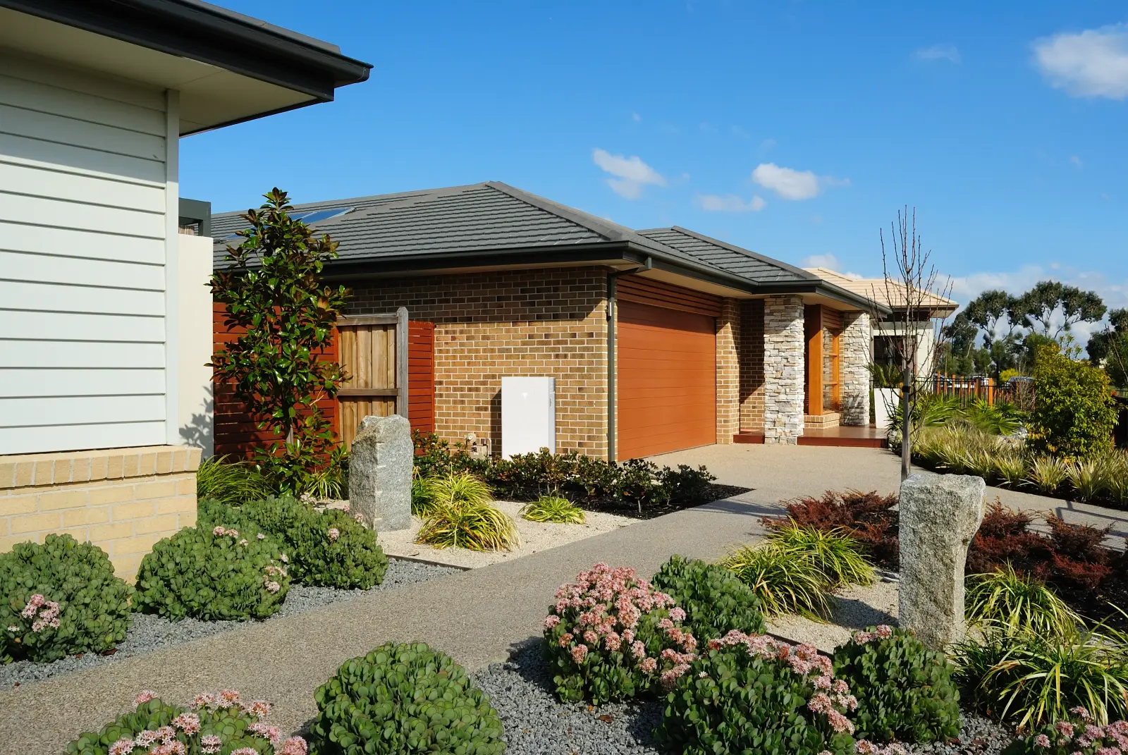 Tesla Powerwall 3 battery storage unit installed on a home wall