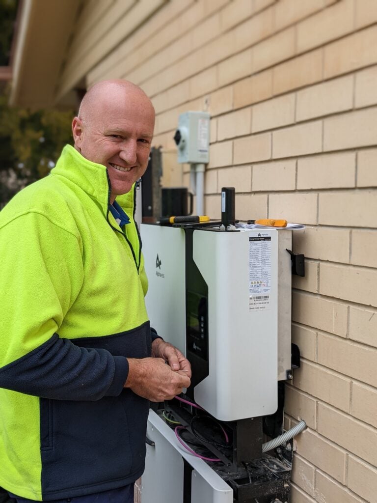 Peter Havis installing an Alpha ESS battery system