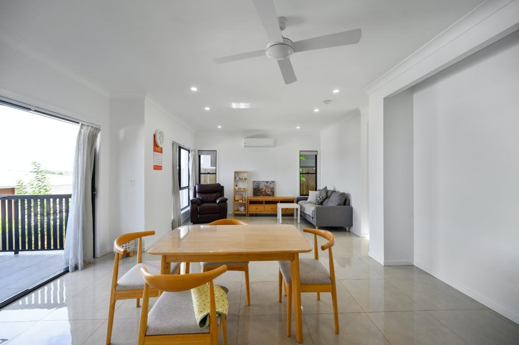 Modern home interior with LED downlights and ceiling fan — ElectricalPro