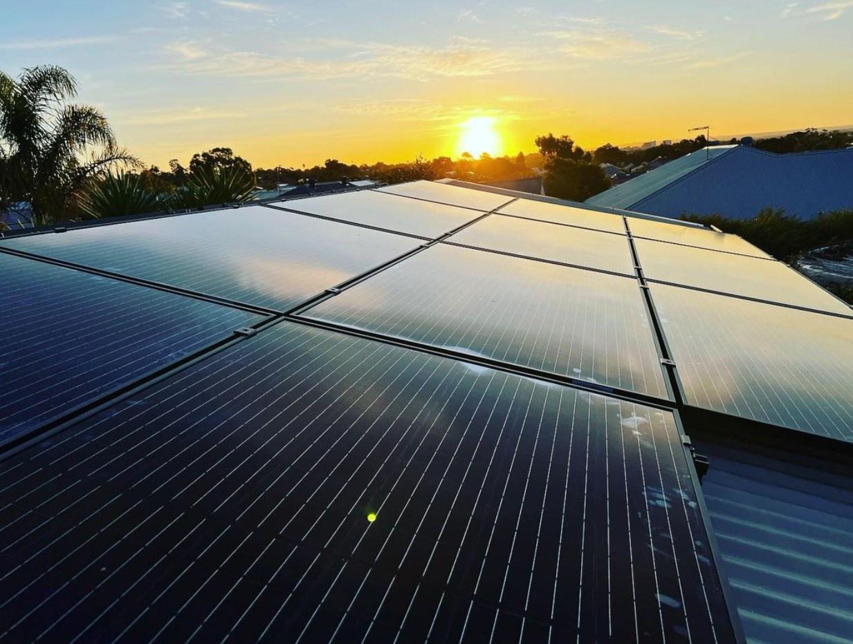 Happy customers with ElectricalPro solar installation